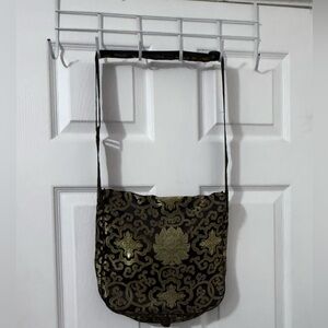 Vintage Black and Gold Crossbody Bag with Elegant Design